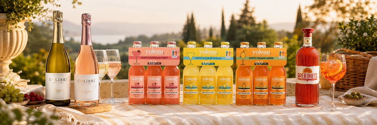 Long-weekend alcohol-free bundle with Colibrì sparkling wines, Yoleau spritz packs and Aperiniets on a sunlit terrace.
