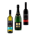A trio of Lussory non-alcoholic wines featuring Chardonnay White, Premium Sparkling, and Merlot Red bottles against a neutral background.