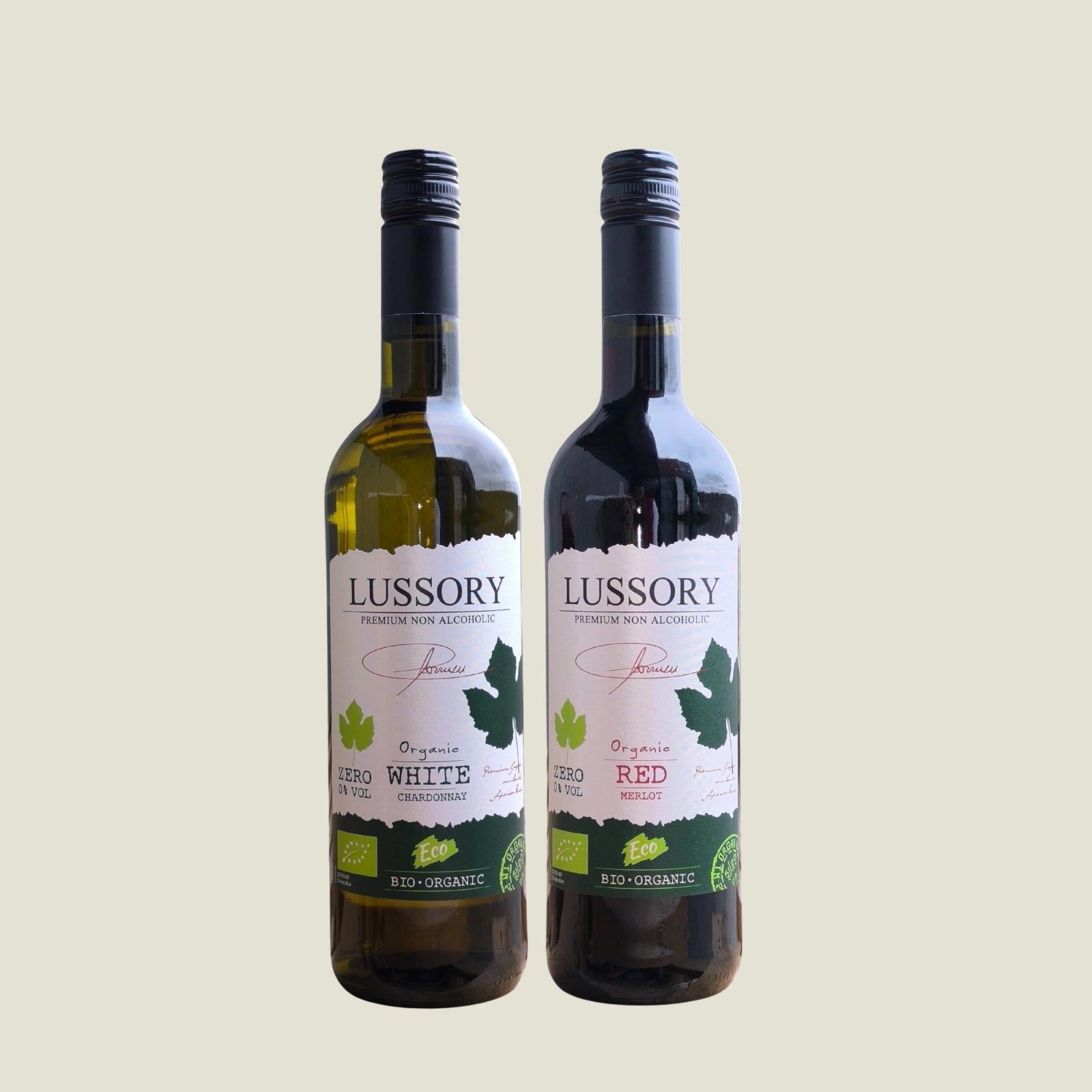 Two bottles of Lussory organic non-alcoholic wine, Chardonnay White and Merlot Red, displayed side by side on a neutral background.