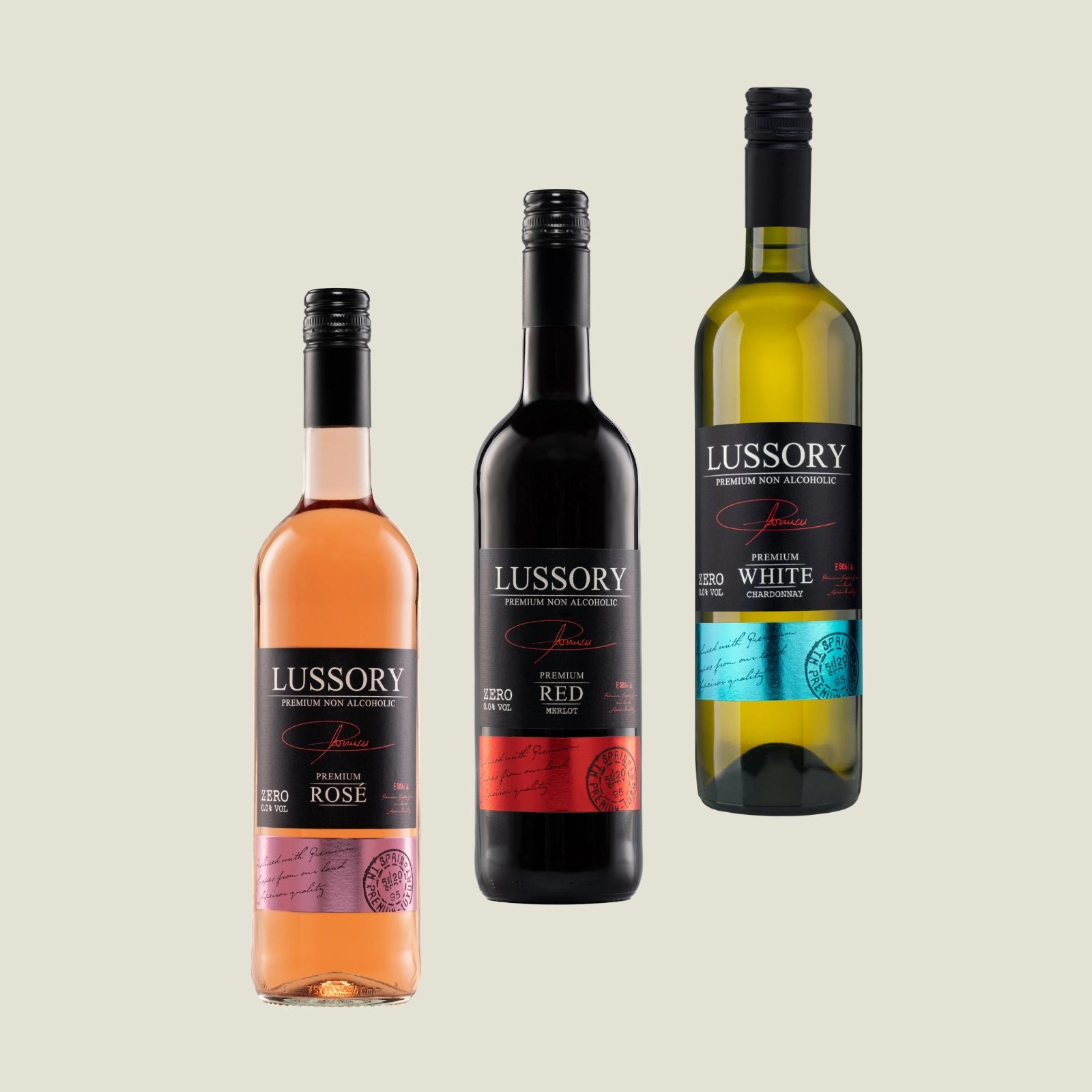 Three bottles of Lussory premium non-alcoholic wines — Rosé, Merlot Red, and Chardonnay White — displayed on a light background.