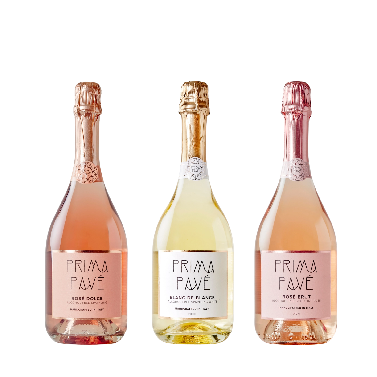 Close-up of three Prima Pavé alcohol-free sparkling wines — Rosé Dolce, Blanc de Blancs, and Rosé Brut — on a soft neutral background.