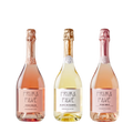 Close-up of three Prima Pavé alcohol-free sparkling wines — Rosé Dolce, Blanc de Blancs, and Rosé Brut — on a soft neutral background.