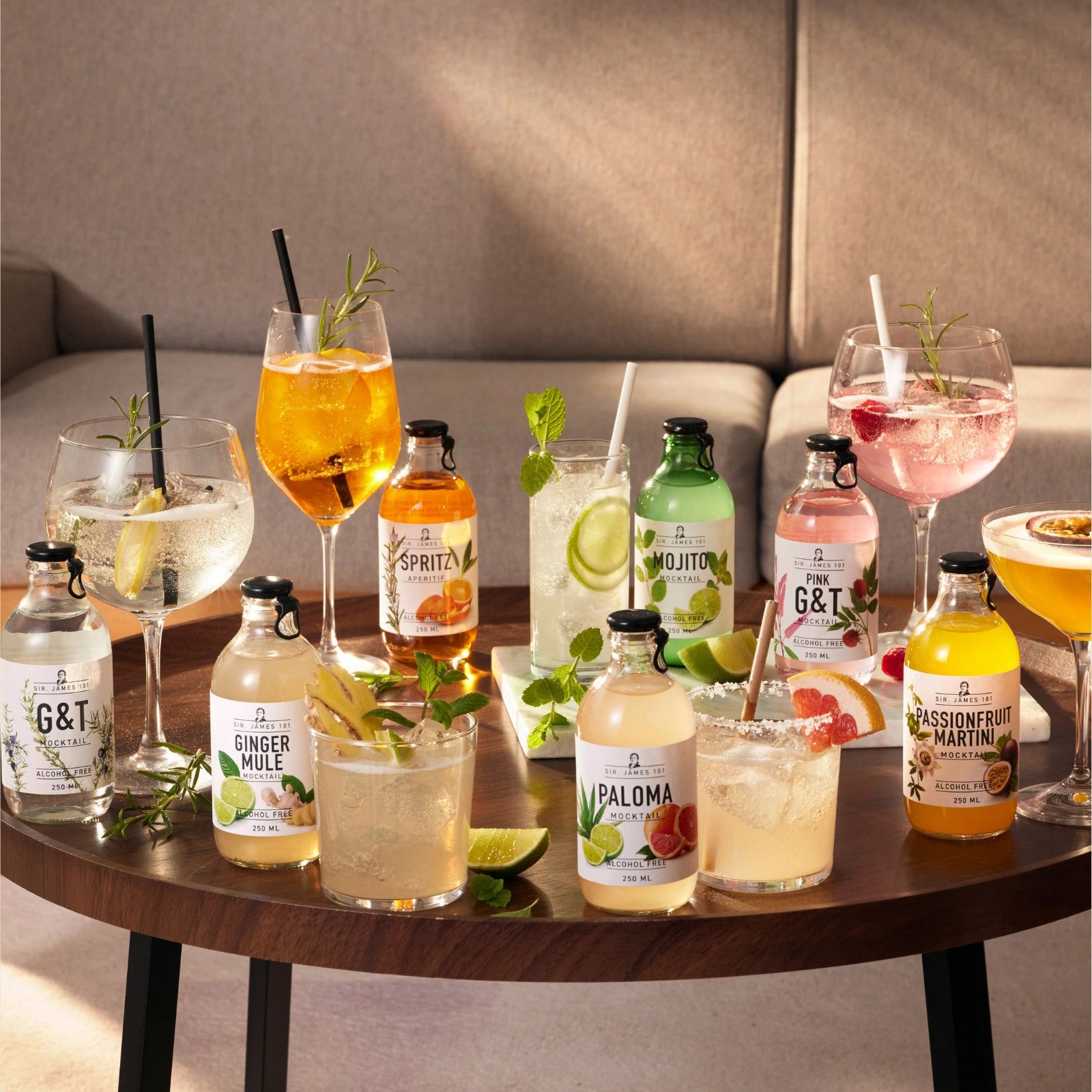 Selection of Sir James 101 alcohol-free mocktails served on a table with garnishes and glasses ready to drink
